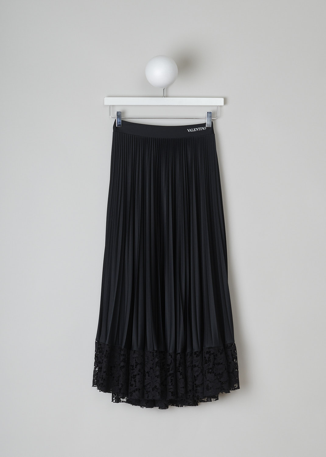 VALENTINO, BLACK PLEATED SKIRT WITH LACE TRIM, TB3MD01H575_0N0, Black, Front, This black pleated skirt has a partly elasticated waistband with the brand's logo on it to one side. The skirt has a below-the-knee length. The straight hemline has a broad black lace trim.   
