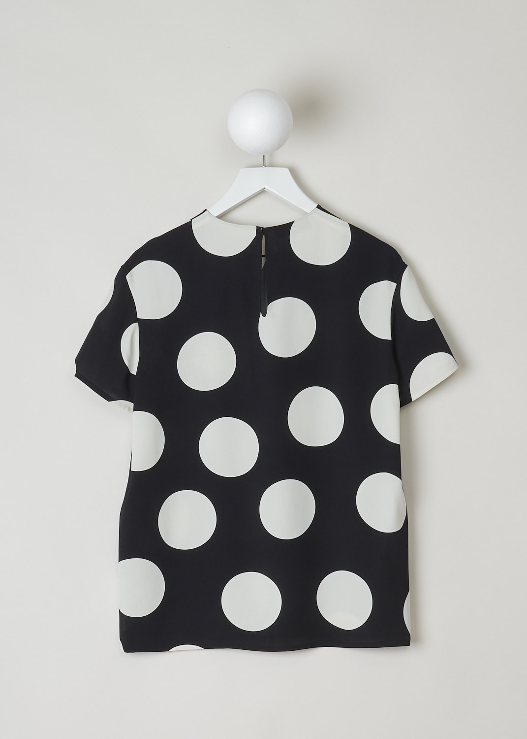 VALENTINO, BLACK TOP WITH BIG WHITE DOTS, VB3AE5P5661_0NA, Black, White, Print, Back, This boxy silk top has a black base with a big dotted print in white.  The top has a high, round neckline and short sleeves. In the back, a single button with keyhole functions as the closure option. The top has a wider silhouette.

