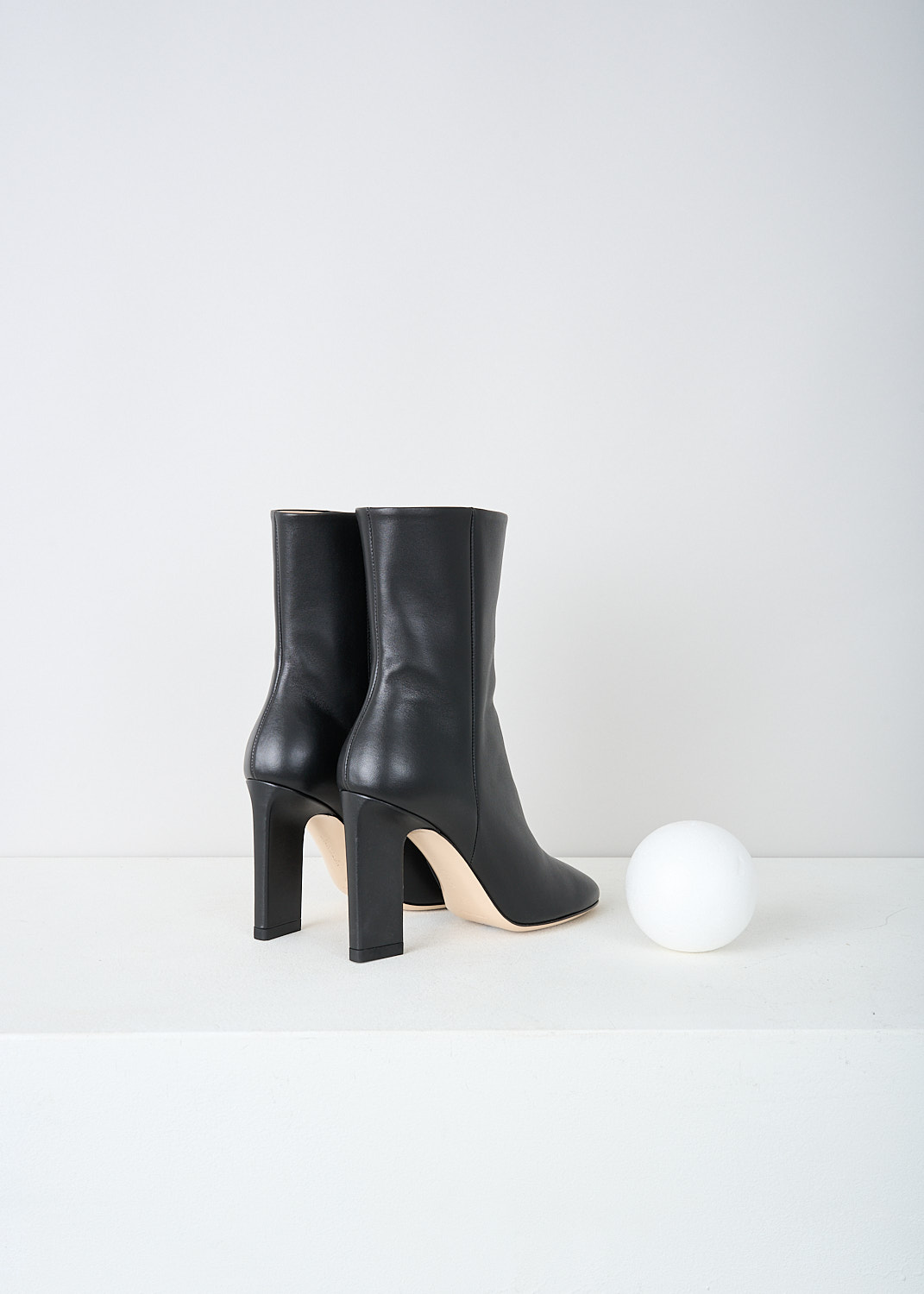 Wandler, Black leather Carly boots, CARLY_BOOT_BLACK_20210_271201_3200, Black, Back, These black leather Carly ankle boots  a zipper on the inside of the leg, a blocked heel and a round toe. 
