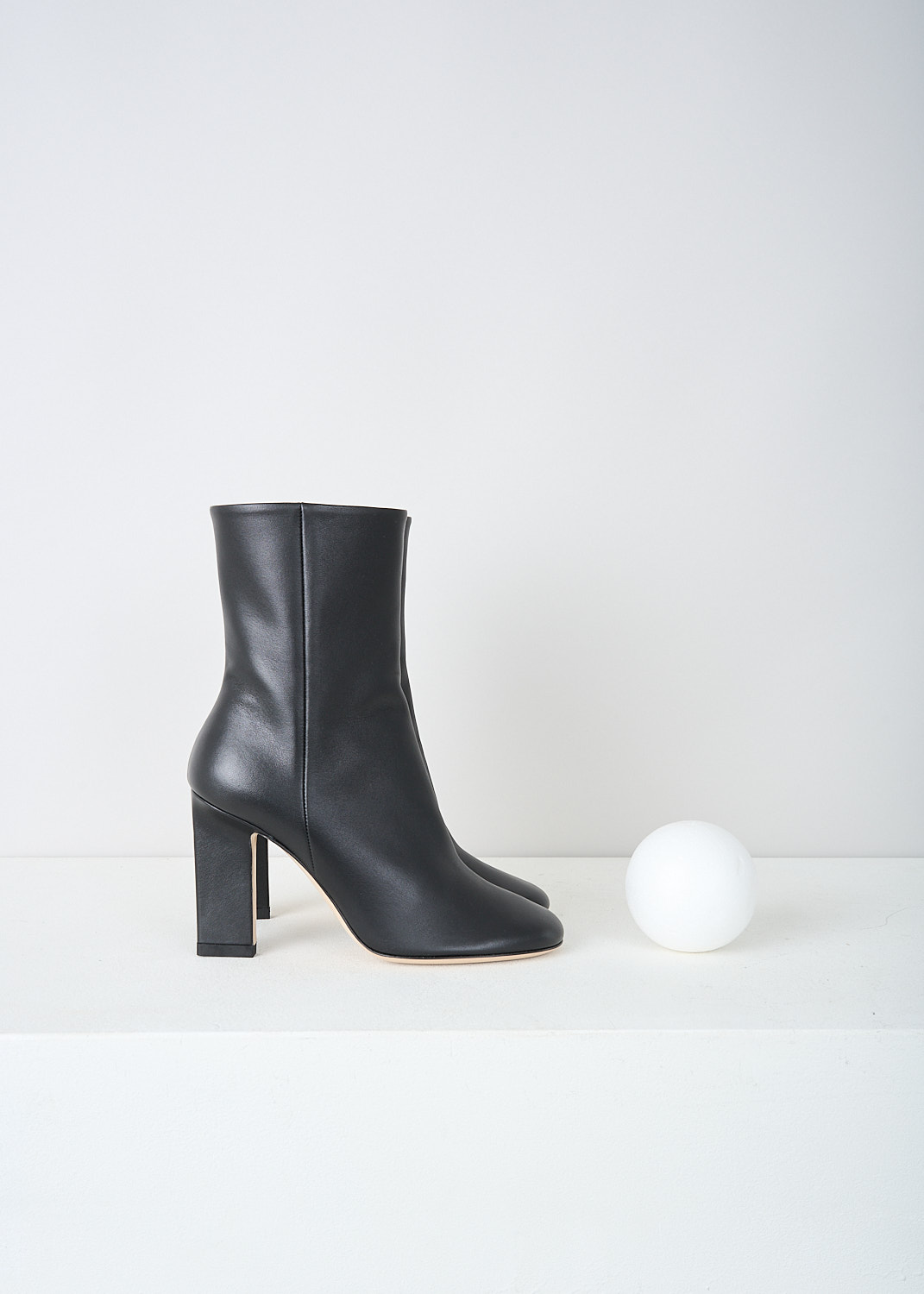 Wandler, Black leather Carly boots, CARLY_BOOT_BLACK_20210_271201_3200, Black, Side, These black leather Carly ankle boots  a zipper on the inside of the leg, a blocked heel and a round toe. 
