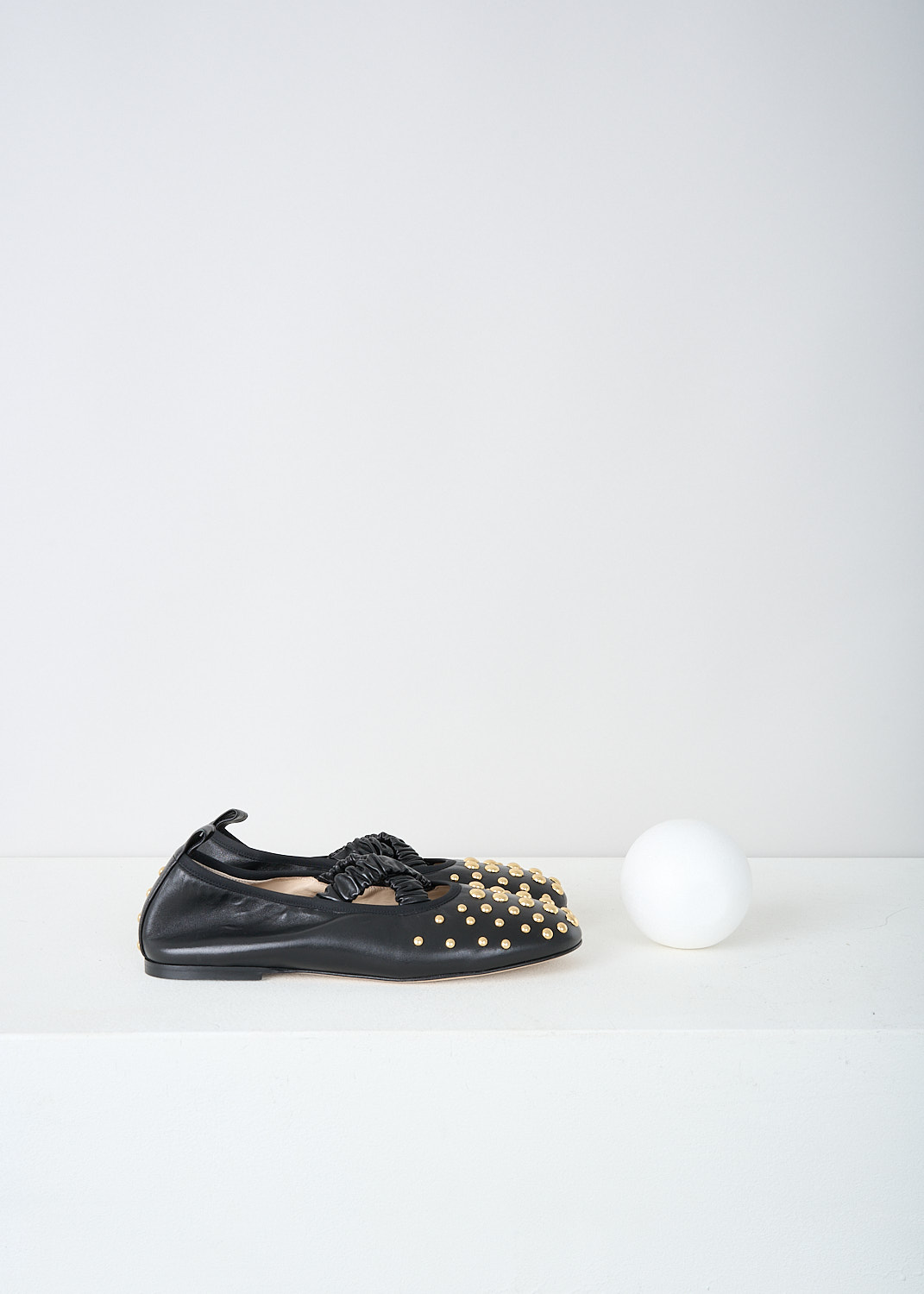 Wandler, Black June ballerina flats with studs, JUNE_BALLERINA_BLACK_STUDS_24202_000117_3224, Black, Side, These black June ballerina flats have an elasticated crossover-strap and a pull-tab at the heel. The round toe and the heel are decorated with gold-tone round studs. 

