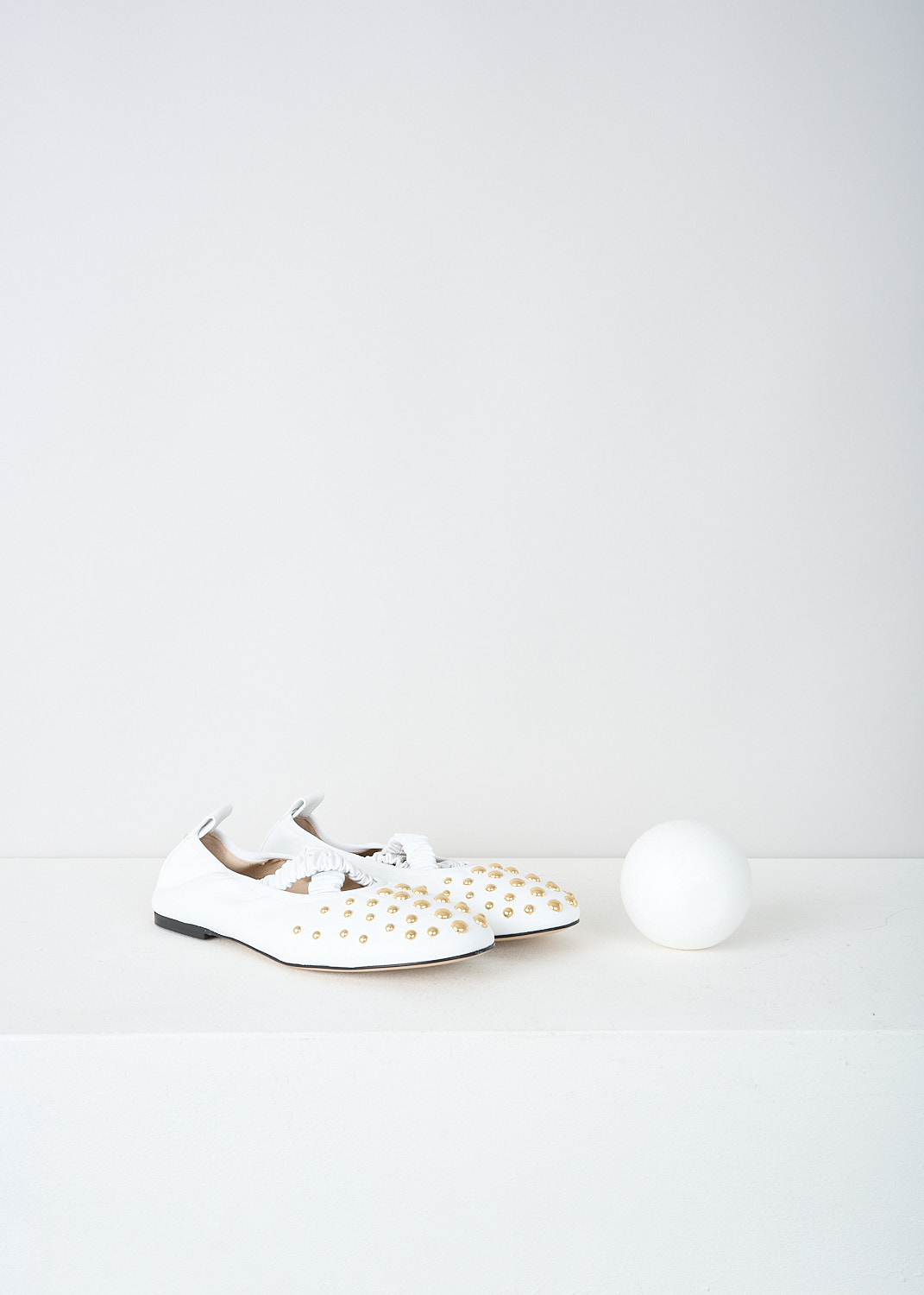 Wandler White June ballerina flats with studs, JUNE_BALLERINA_WHITE_STUDS_24202_000117_1055, White, Front, These white June ballerina flats have an elasticated crossover-strap and a pull-tab at the heel. The round toe and the heel decorated with gold-tone round studs. 

