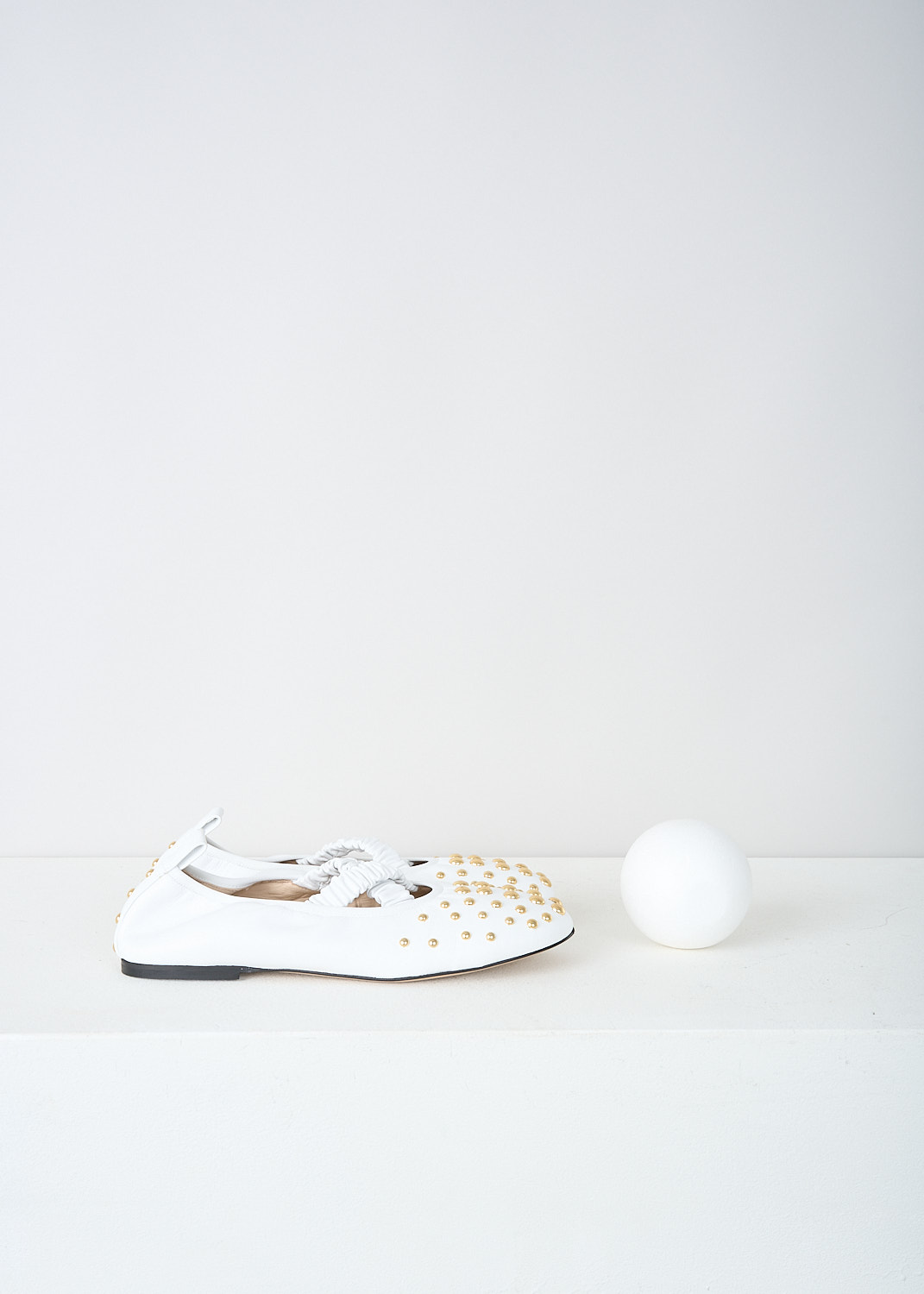 Wandler White June ballerina flats with studs, JUNE_BALLERINA_WHITE_STUDS_24202_000117_1055, White, Side, These white June ballerina flats have an elasticated crossover-strap and a pull-tab at the heel. The round toe and the heel decorated with gold-tone round studs. 

