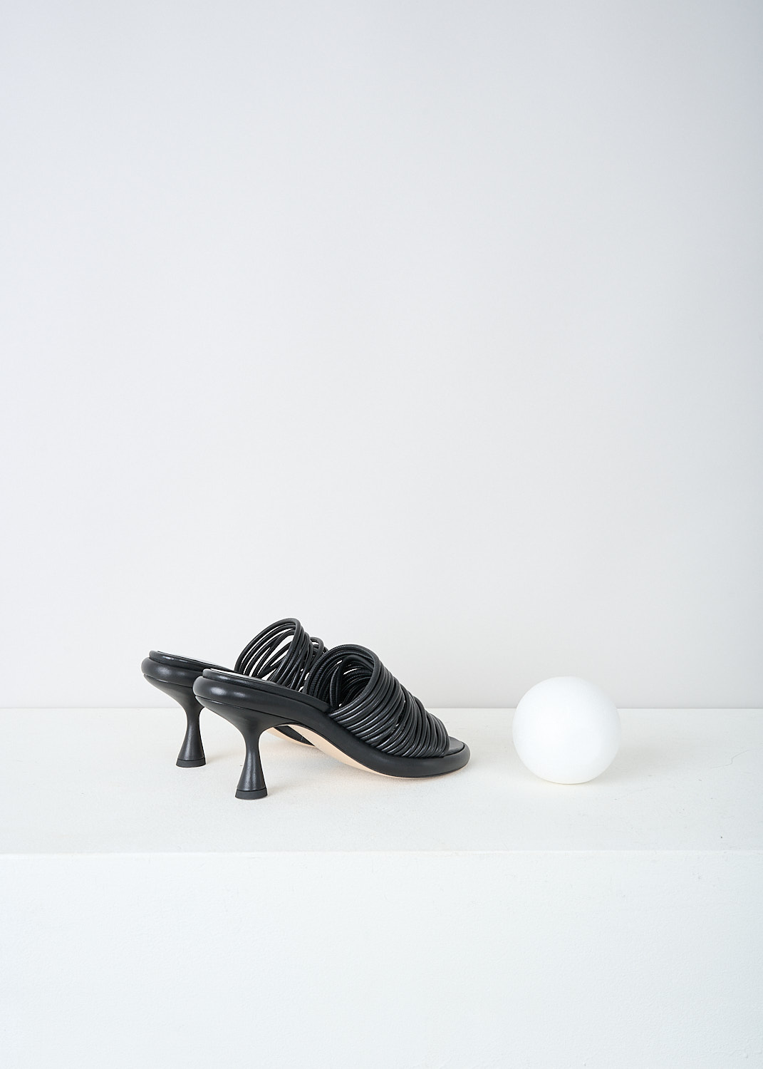 Wandler, June strappy platform mules in black, JUNE_STRAPPY_PLATFORM_BLACK_22208_861201_3200, Black, Back, These June strappy platform mules in black have a broad multi-strap across the vamp. These pumps have a rounded open-toe and and a platform sole. The slip-on mules have a mid-height spool heel.

 
